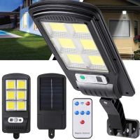Solar Powered Street Lamp Solar Street Light BL BK-120-6COB Wall-mounted Rechargeable LED Flashlight with Remote Control and Motion Sensor on a pole