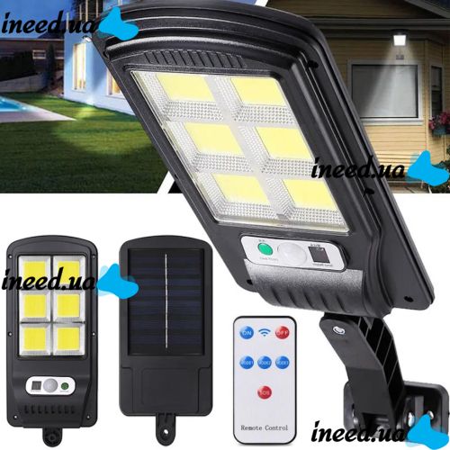 Solar Powered Street Lamp Solar Street Light BL BK-120-6COB Wall-mounted Rechargeable LED Flashlight with Remote Control and Motion Sensor on a pole