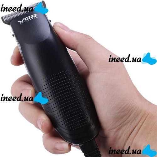 A set of two VGR V-023 2-in-1 rechargeable hair and beard clippers, a wired trimmer with a set of removable attachments in the V023 bag