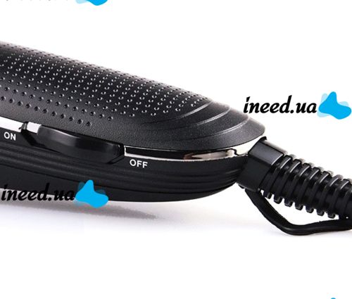 A set of two VGR V-023 2-in-1 rechargeable hair and beard clippers, a wired trimmer with a set of removable attachments in the V023 bag