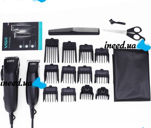 A set of two VGR V-023 2-in-1 rechargeable hair and beard clippers, a wired trimmer with a set of removable attachments in the V023 bag